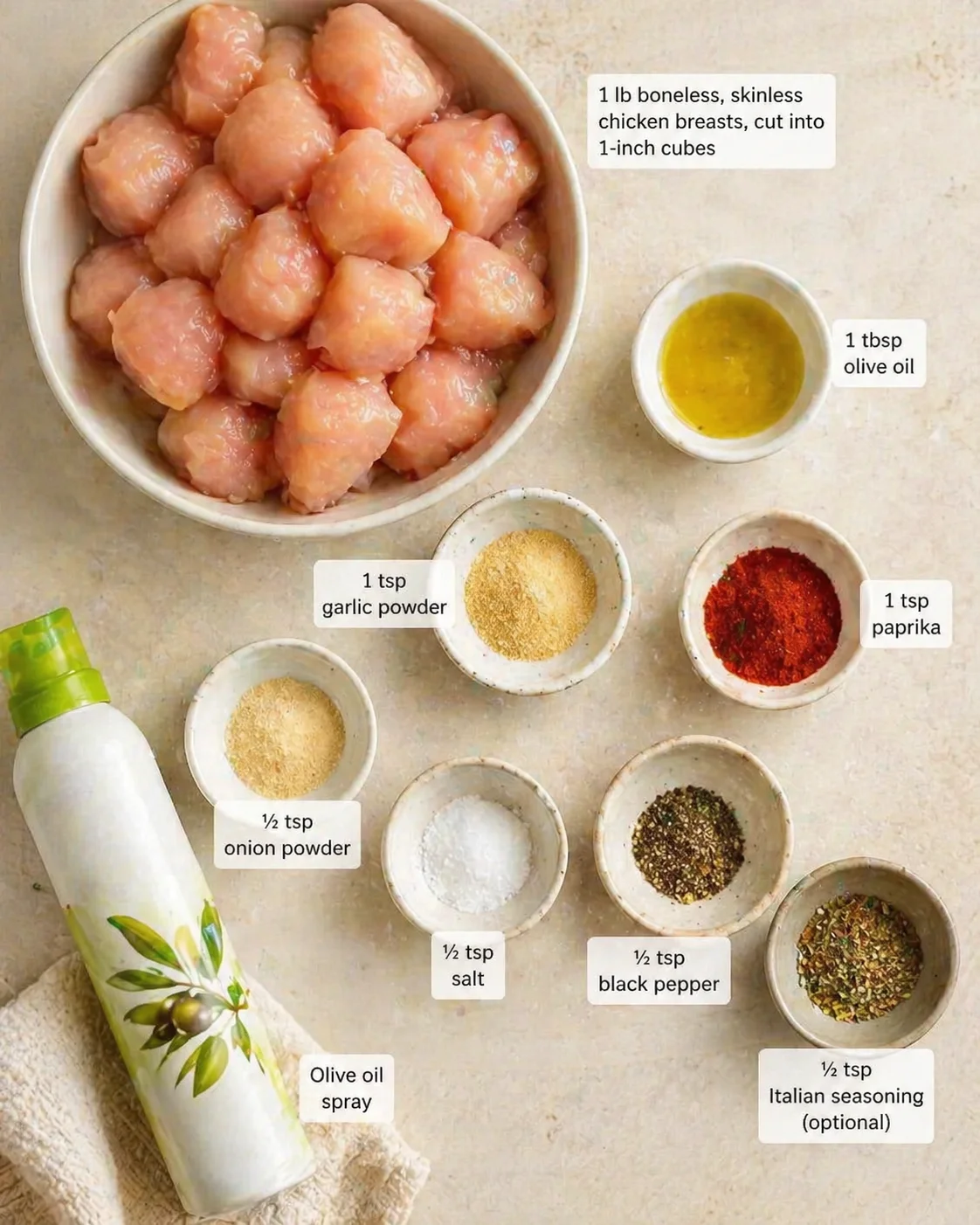 Measured ingredients arranged for Air Fryer Chicken Bites 20 Irresistible Crispy Golden.: 1 lb boneless, skinless chicken breasts, cut into 1-inch cubes — keeping chunks even means they cook perfectly and stay juicy., 1 