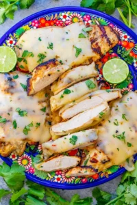 Grilled Salsa Verde Chicken with Pepper Jack — The EASIEST salsa verde marinade keeps this chicken so juicy and tender!! Melted pepper Jack cheese on top takes an already awesome piece of chicken and makes it that much BETTER!!