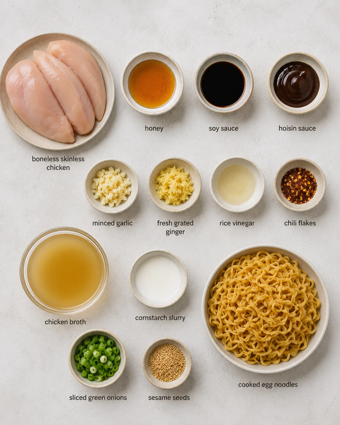 Ingredients for honey garlic chicken noodles in bowls and plate, including chicken thighs, honey, soy sauce, and noodles.