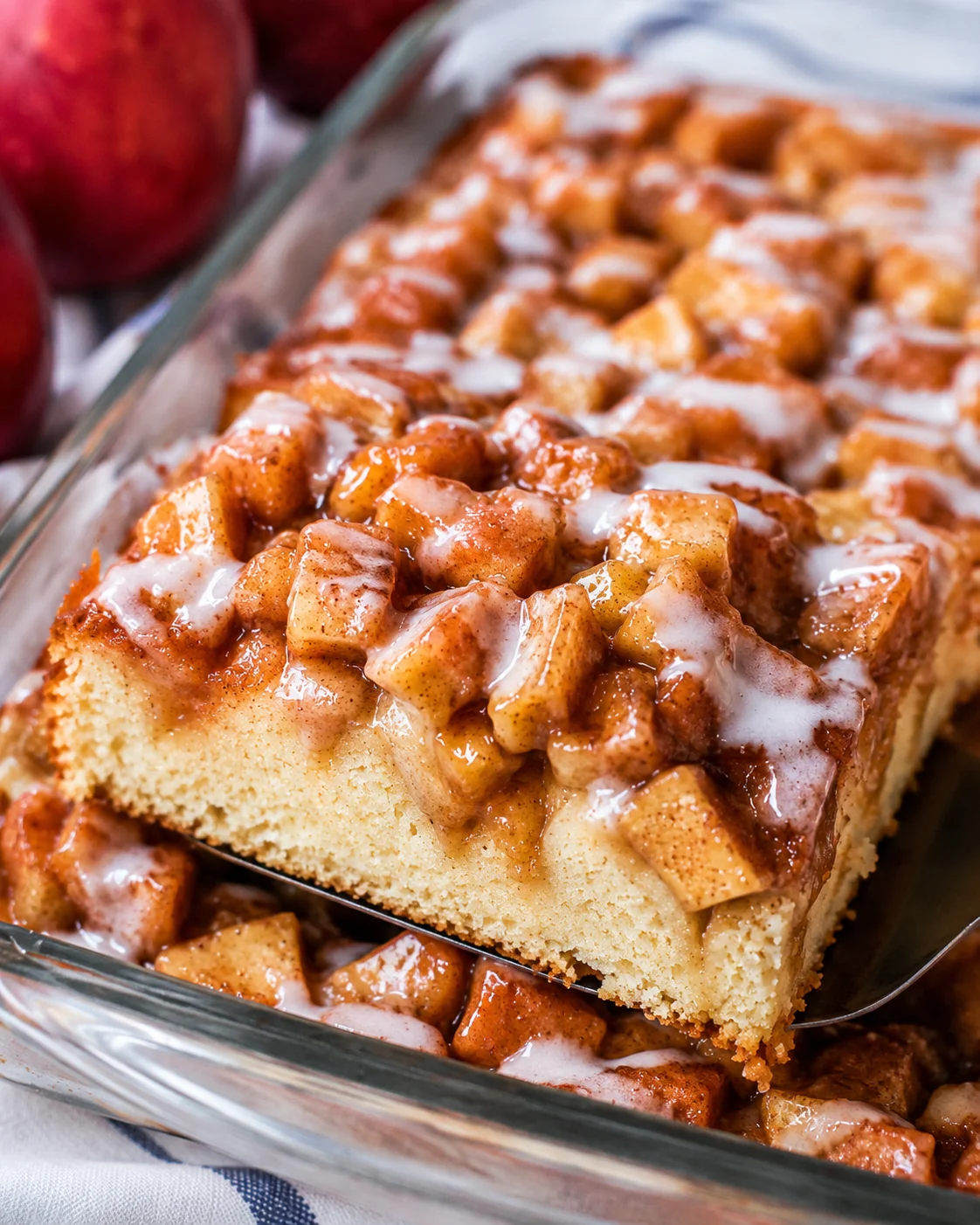 Delicious apple pie coffee cake topped with sweet glaze and apple filling